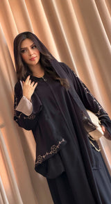 Taj Abaya